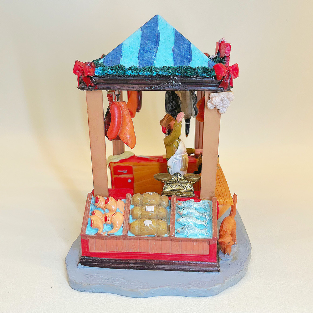 تمثال من الراتنج يصور كشك بيع  - مراجعة Vintage Collectible Market وسعره